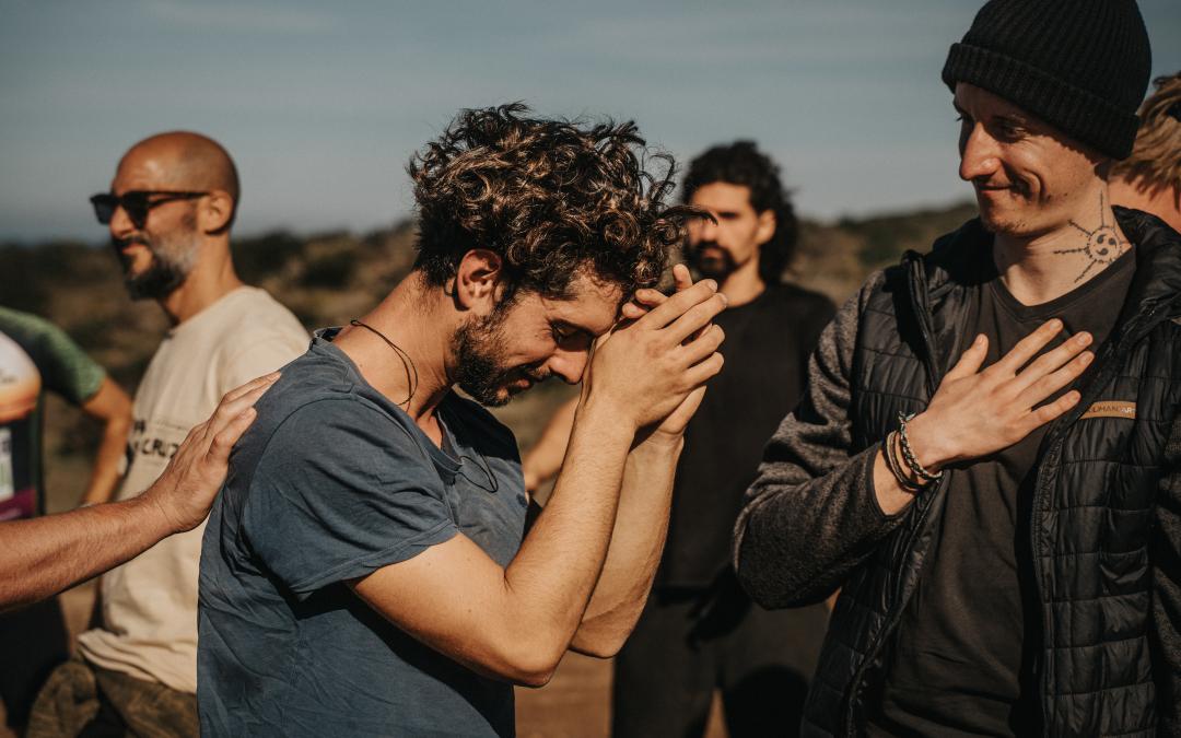 Men leaving the fire circle