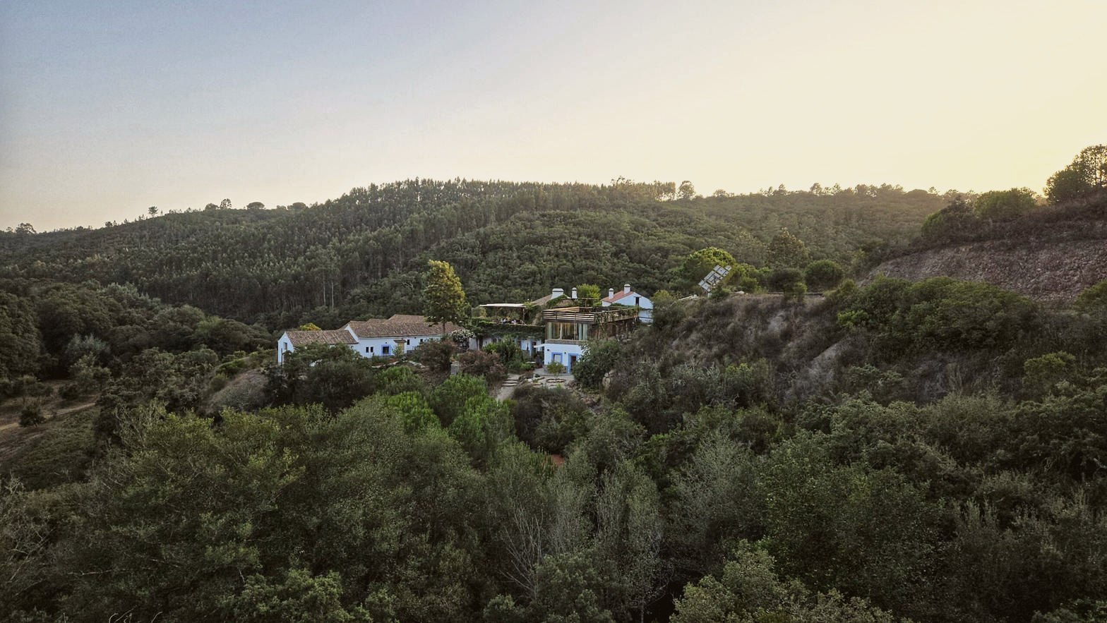 Monte da Orada at dusk, white houses in the woods of Odemira
